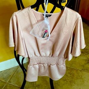 Size small pale pink also a pale pink bracelet